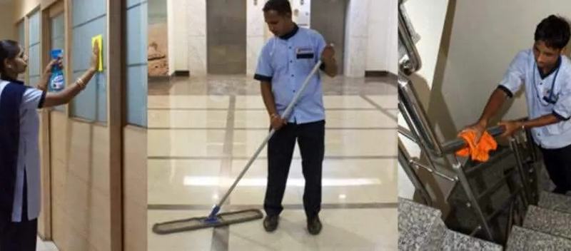 Housekeeping staff cleaning glass, mopping and polishing